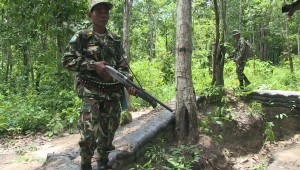 Armed forest rangers patrol a Thai national park in 2013 (c) EIA