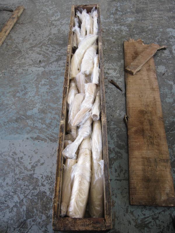 Ivory tusks hidden inside a wooden crate, 2013 (c) Hong Kong Customs